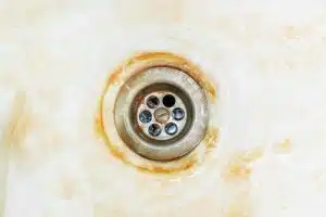 damage of iron water in bathroom sink