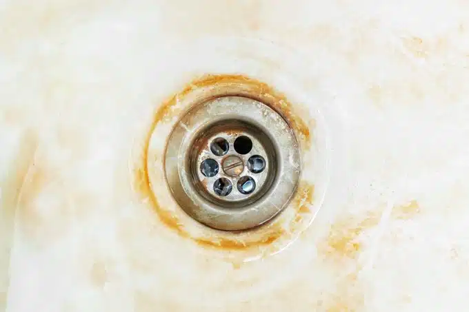 damage of iron water in bathroom sink