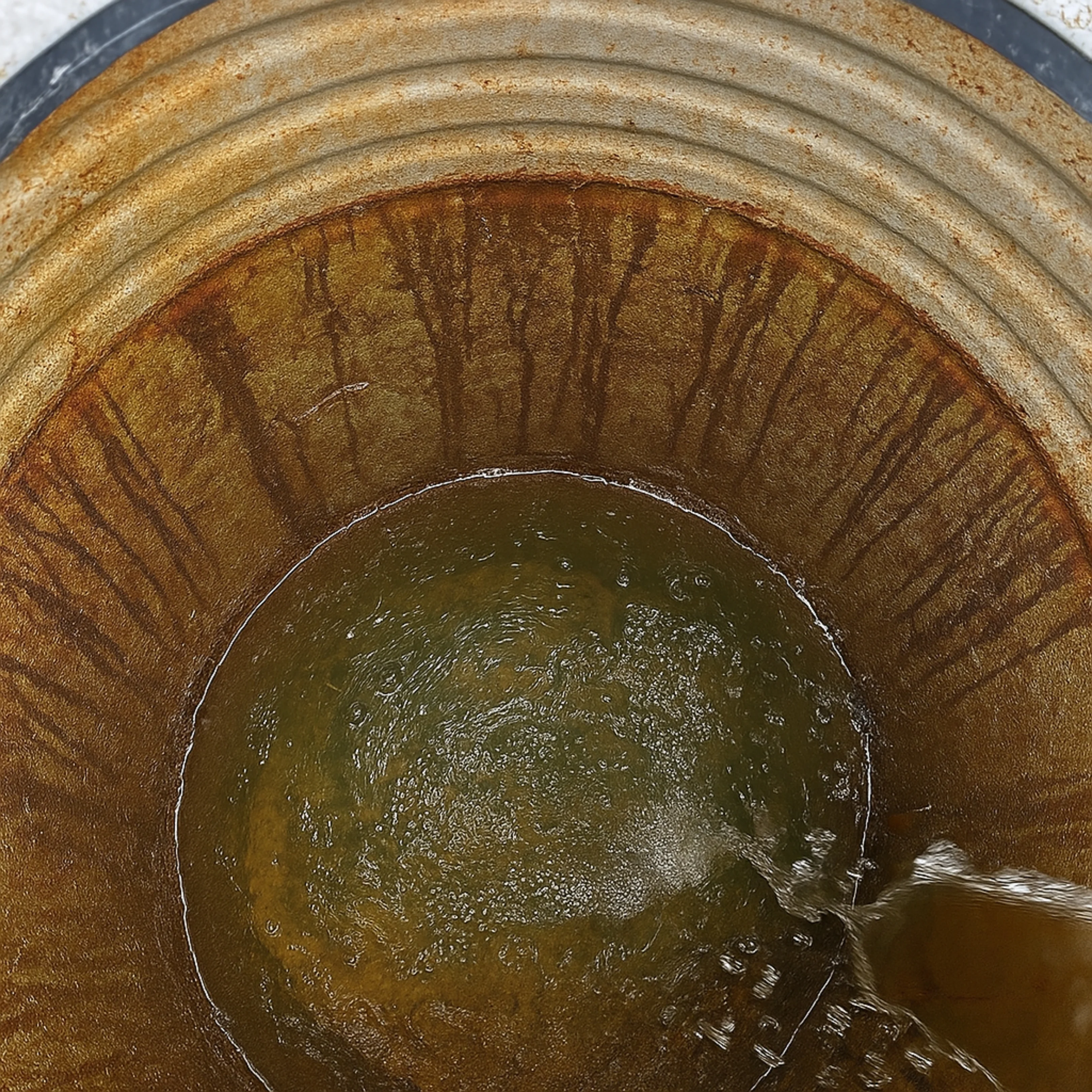 iron water  and sediment in water tank bottom line